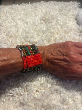 Handmade Multicolor Beaded Bracelet with Bold Red Accent